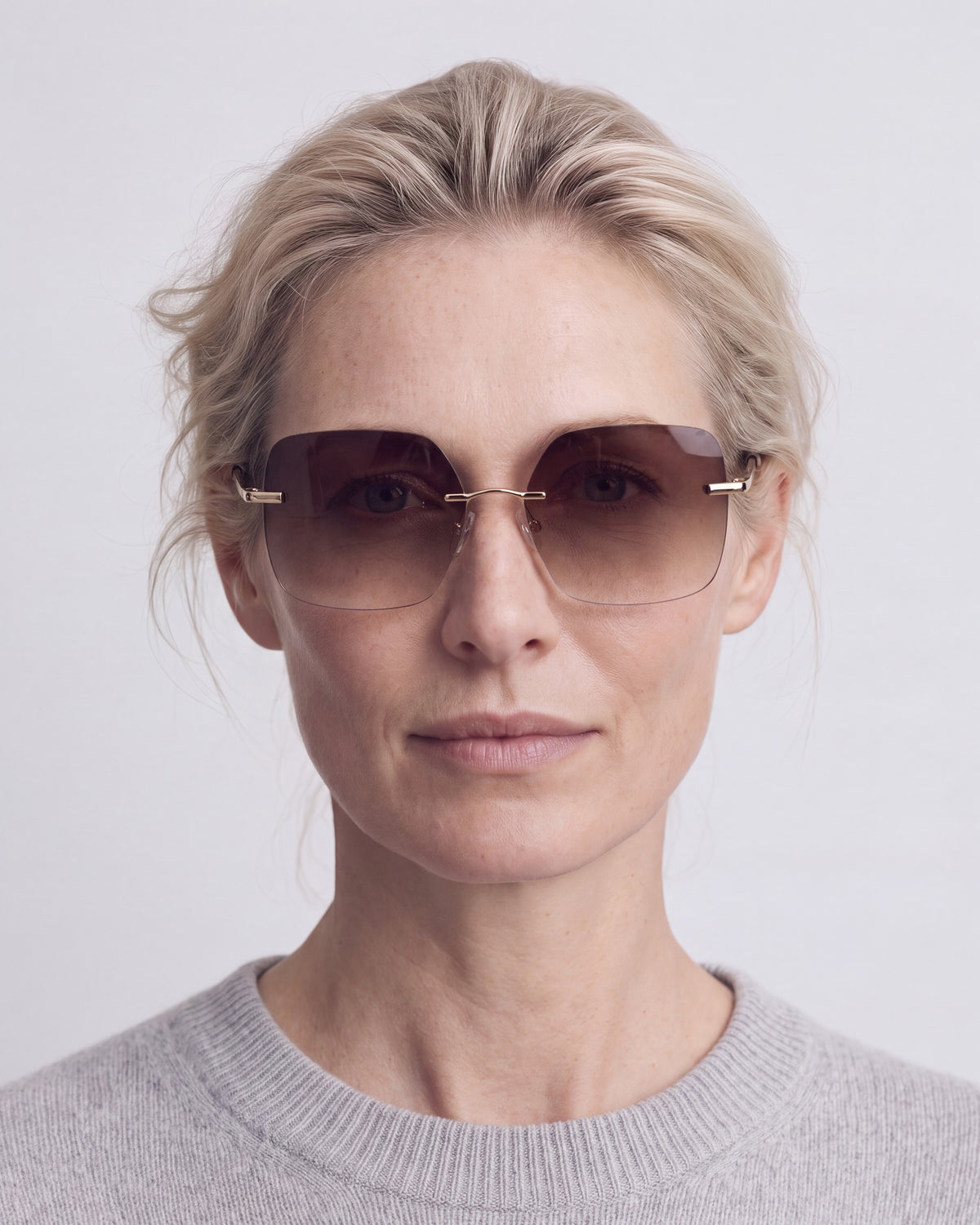 Billie Gold Rimless Sunglasses, worn