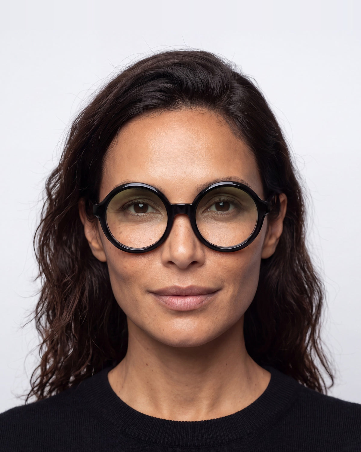 Rakel in black, worn, Sage lenses